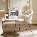 furnish-theory-nordic-comfort-dining-armchair-arm-chair-cushion-padded-frosted-almond-boucle-fabric-upholstered-seat-back-black-powder-coated-steel-legs_01.webp